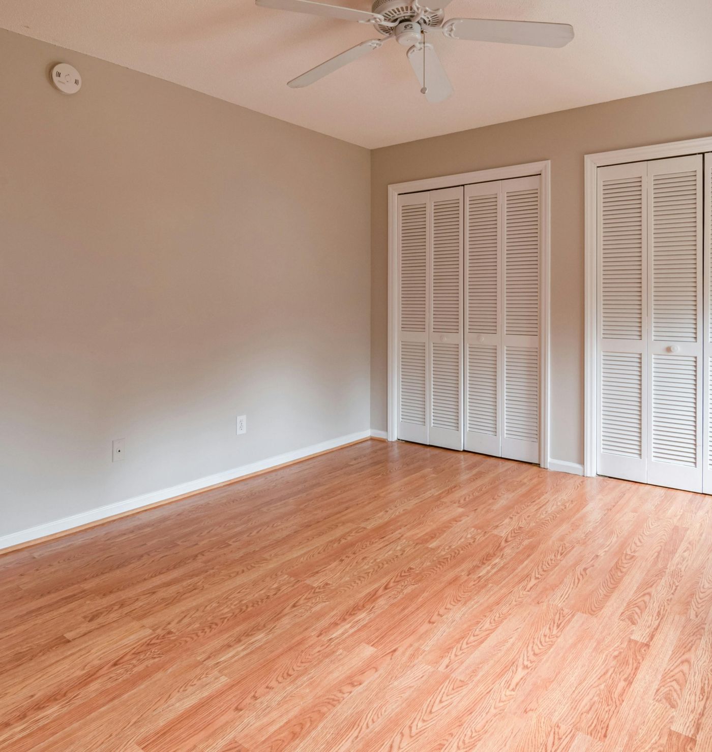 Empty room with new laminate flooring